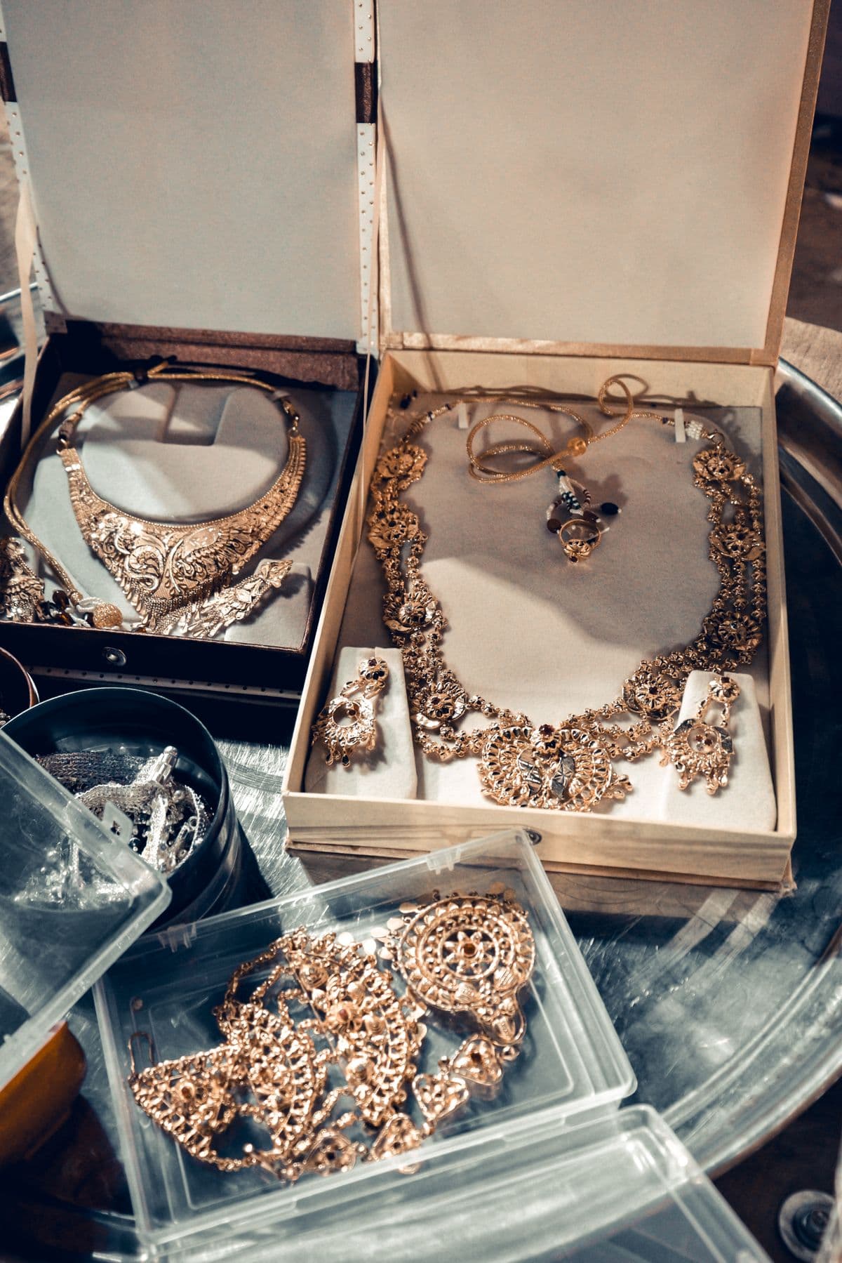 Indian gold necklaces displayed in archival jewelry boxes