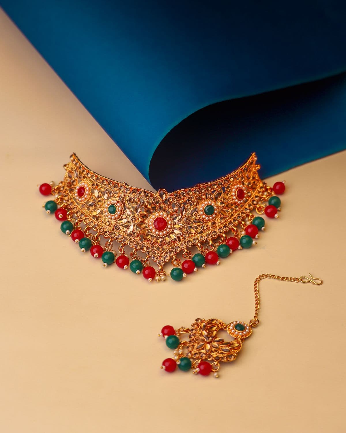 Traditional Kundan choker with red and green beads